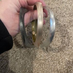 3 Alexis Bittar lucite bangles. Black, light rose and white.